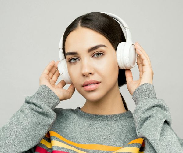 Close up of a person meditating with relaxed facial muscles